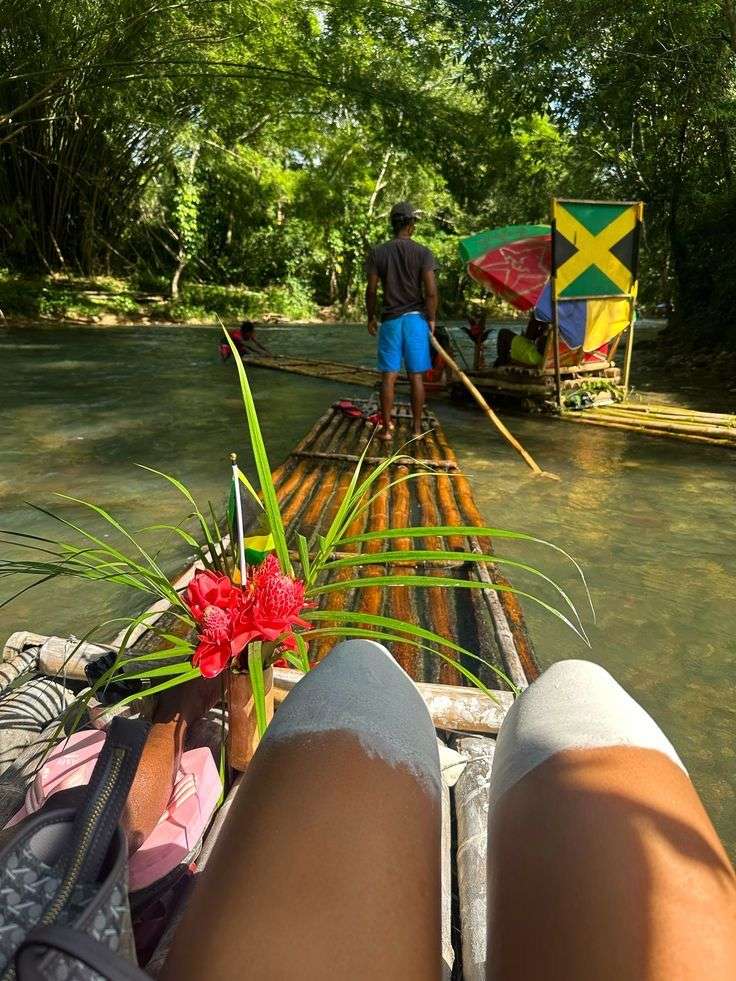 Person relaxing during Jamaican bamboo river rafting tour